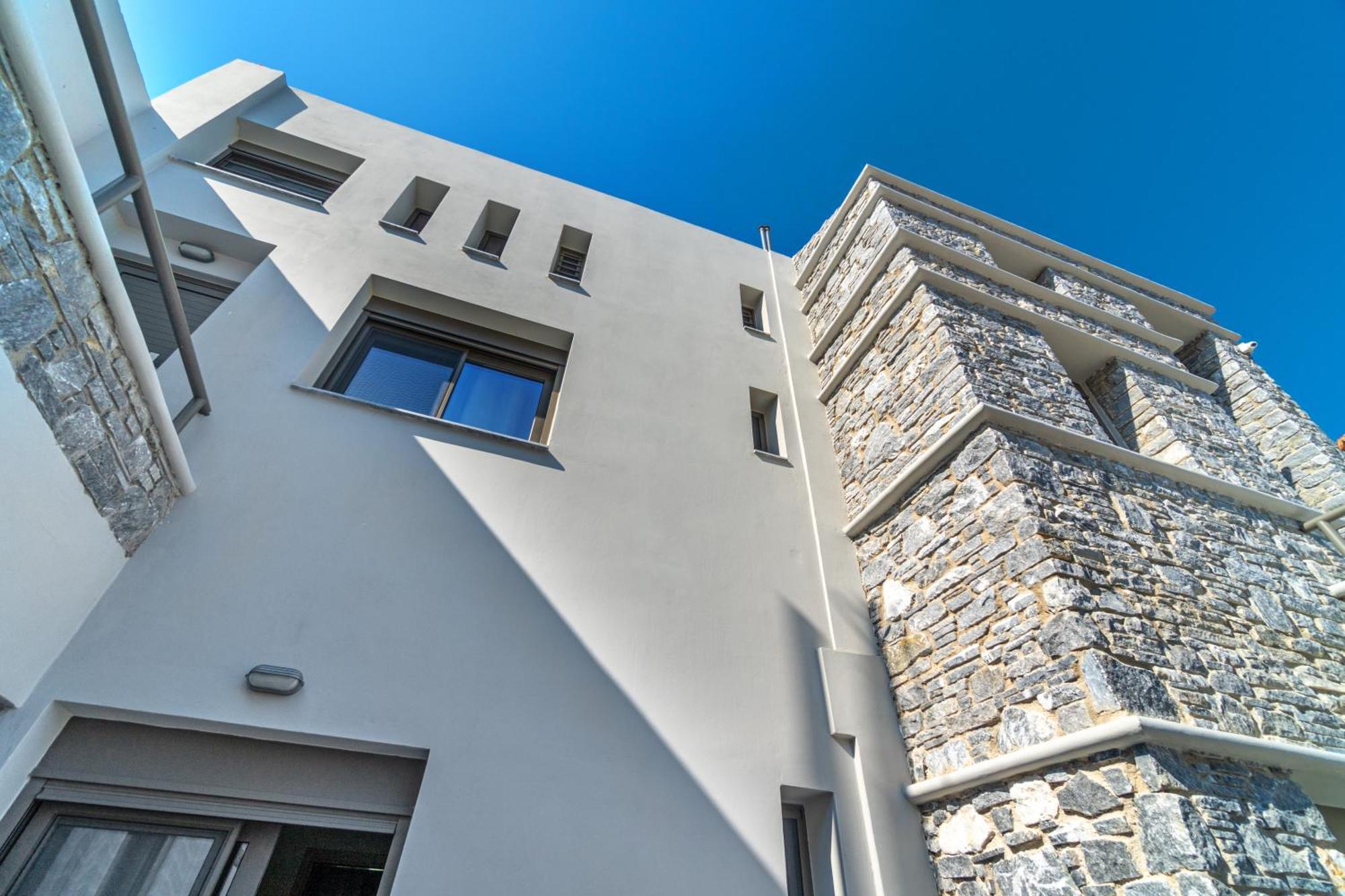 La Perla Suites Agioi Apostoli Exterior foto